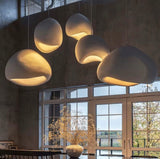 Modern Japanese Wabi Sabi pendant light featuring an elegant white high-density polystyrene lampshade with minimalist aesthetics