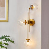 KAWOTI
29.25 in. 3-Light Antique Brass Wall Sconce with Clear Glass Shades