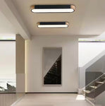 Lumin 38 in. W 1-Light Black and Wood Integrated LED Flush Mount Minimalist Long Oval Ceiling Light for Hallway/Kitchen