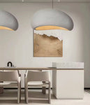 Modern Japanese Wabi Sabi pendant light featuring an elegant white high-density polystyrene lampshade with minimalist aesthetics