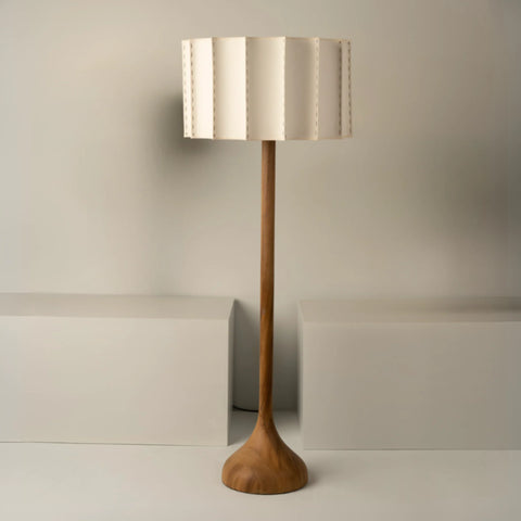 The Elephant's Foot 
Hand turned Parota wood base.
Fabric-lined lampshade with fiberglass and polystyren